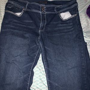 Blue boot cut pants with rimestones